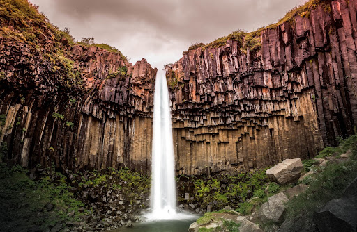 Svartifoss Waterfall in Iceland on a cloudy day
