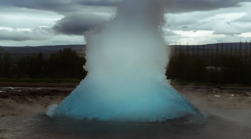 Geysir in Iceland just beginning to erupt water and steam