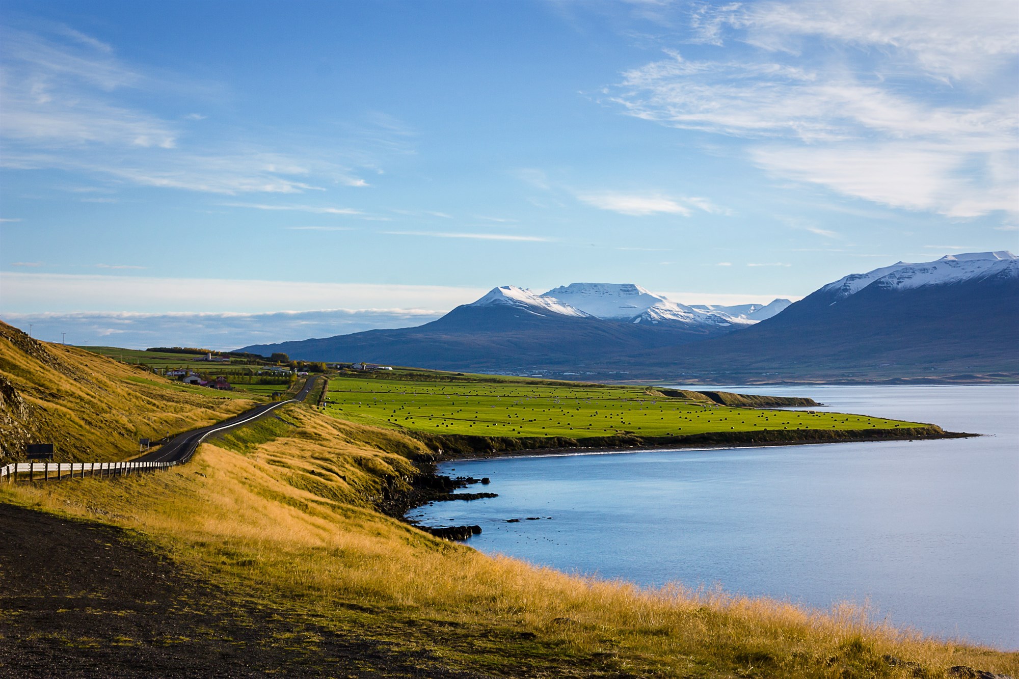 Road through Akureyri landscape in Iceland.